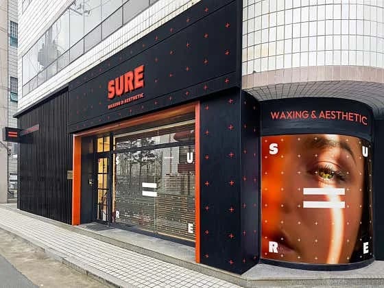 대백프라자 야외주차장 맞은편 더슈어 매장 입구